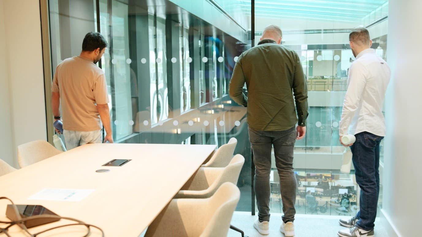 Employee collaborating at ESW's new Dublin hub's meeting room